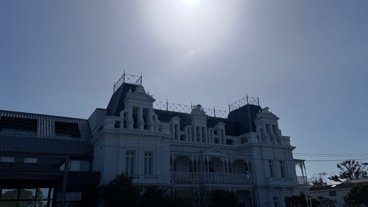 The Beaumaris Hotel roofline silhouetted against the sky