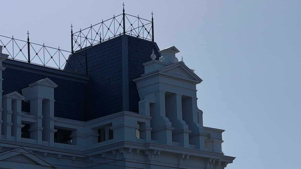 Slate tower roof with iron cresting, seen from below